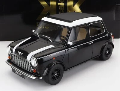 MODELLINO AUTO STATICO DIECAST MINI COOPER SUNROOF LHD 1992 NERO SCALA 1/12 - Immagine 1 di 4