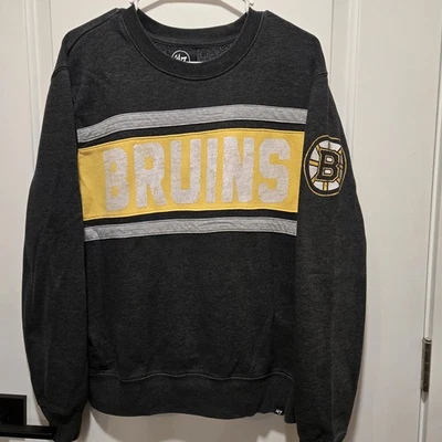 Suéter Boston Bruins '47 Marca Cuello Redondo Talla Mediana NHL Gris Pullover Usado en Excelente Condición Foto 1 de 4