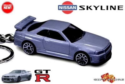🎁 🆕 LLAVERO ULTRA RARO GRIS PLATA NISSAN SKYLINE GTR GT-R R34 💕GRAN REGALO💕 Foto 1 de 4
