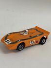 Vintage Aurora AFX #54 Orange McLaren XLR Slot Car Incomplete Untested