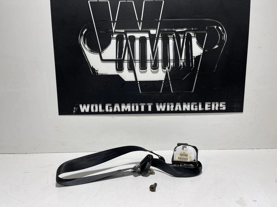 Retractor de cinturón de seguridad macho delantero de fábrica para conductor izquierdo Jeep Wrangler TJ 2003-2006 Foto 1 de 4