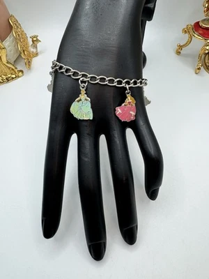 "BRAZALETE VINTAGE CON DIJE PERSONALIZADO DE PIEDRAS PRECIOSAS ESMALTADAS PRINCESA DISNEY 5 DIJES 7""" Foto 1 de 4