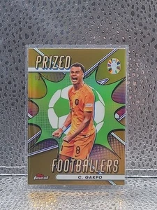 Topps Finest UEFA Euro 2024, Cody Gakpo, Calciatori Premiati Oro /50 - Foto 1 di 3