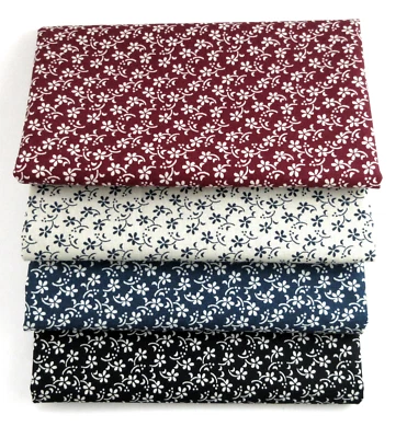 Paquete de 4 cuartos de grasa, rojo, crema, azul y negro con detalles florales Foto 1 de 4