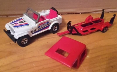Majorette Jeep LAREDO Race Team con Carrello Serie Supermovers 1995 Scala 1:32 - Immagine 1 di 4