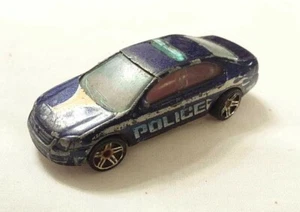 Hot Wheels - Ford Fusion - 1:64 - Police - 2009 - HW City Works 03/10 - Foto 1 di 3