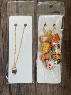 Juego de 2 dijes y collar bolsa dorada Love Breakfast Foto 1 de 4