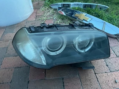 Conjunto de faros adaptativos de xenón derecho lado pasajero BMW X3 2007-2010 Foto 1 de 4