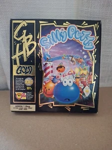 SILLY PUTTY. GREMLIN. AMIGA GAME, SMALL BOX, GBH GOLD. COMPLETE EXCELLENT - Zdjęcie 1 z 7