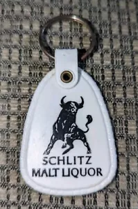 PORTACHIAVI VINTAGE SCHLITZ MALT LIQUOR LOGO BULL bianco/raro/NOS!!! - Foto 1 di 2