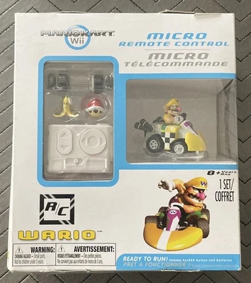 Mario Kart Wii Micro Control Remoto Coche Wario R/C Nintendo Target ¡NUEVO! RARO Foto 1 de 3