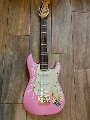 Hello Kitty Pink Squier mini guitar by Fender - Image 1 of 4