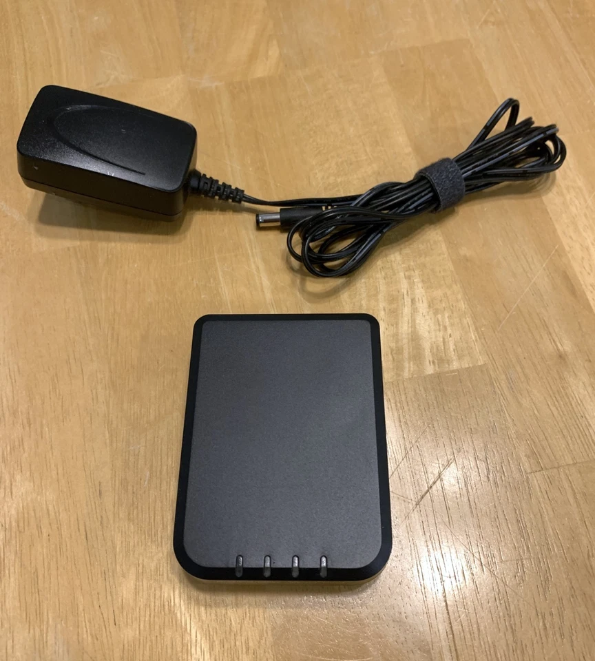 BasicTalk Model HT701 - Home Phone VoIP Landline Adapter with Power Cord - Image 1 of 3