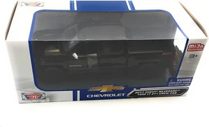 Camión diecast Chevy Silverado 1500 LT Z71 2017 negro escala 1:24 doble cabina - Imagen 1 de 4