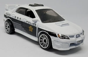 Matchbox White & Black '07 Subaru Impreza WRX Japan Police Loose Diecast 1:64 - Picture 1 of 6