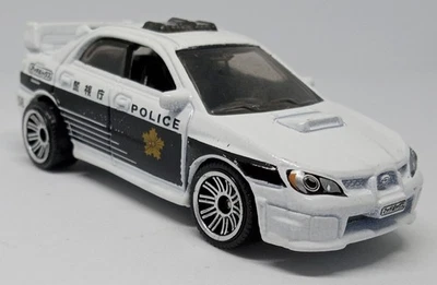 Matchbox Blanco y Negro '07 Subaru Impreza WRX Japón Policía Suelto Diecast 1:64 Foto 1 de 4