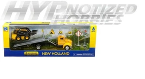 NEW RAY 1:43 PETERBILT ROLL OFF W/ NEW HOLLAND SKID LOADER 16173 - Picture 1 of 2