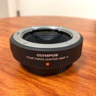 Adaptador Olympus MMF-3 cuatro tercios para lentes de cuatro tercios Foto 1 de 3