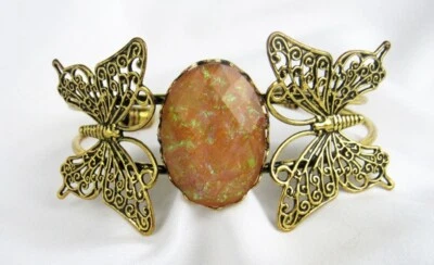 Brazalete Brazalete Mariposa Calado Metal Dorado Ópalo de Fuego Imitación Naranja Foto 1 de 4
