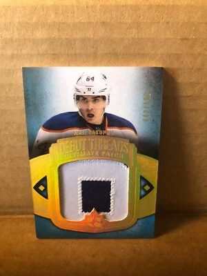 2013-14 Ultimate Collection Debut Threads Patches #UDTNY Nail Yakupov 42/100 - Image 1 of 2