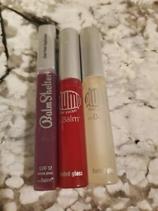 LOT OF 3 The Balm Lipgloss New, Balm Shelter material girl, plump your pucker - Picture 1 of 2