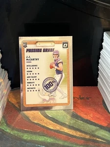 2024 Donruss Optic JJ McCARTHY Passing Grade RC #6 Minnesota Vikings - Bild 1 von 1