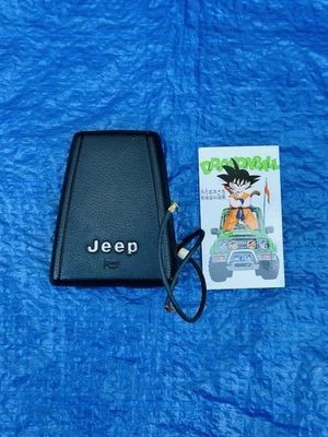 Botón de bocina central del volante Jeep Comanche Cherokee años 80 OEM Foto 1 de 4