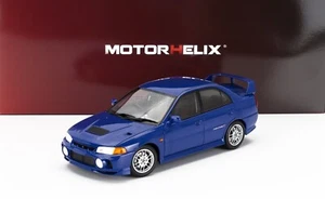 Motorhelix 1/18 Mitsubishi Lancer Evo IV mit Motor 1999 blau M84005 - Bild 1 von 18