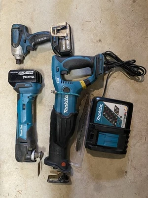 Makita Cordless Tool Lot Multi Tool, Saw, Drill And Charger - Image 1 of 4