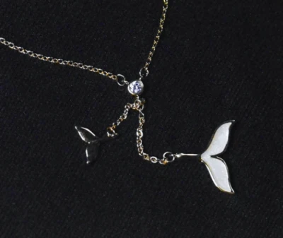 COLLANA IN RAME CON PENDENTI CODA DI SERENA IN CONCHIGLIA E ZIRCONE PER DONNA - Immagine 1 di 4