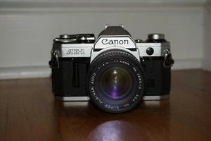 Canon AE-1 35mm Film Camera with MC Super Albinar Auto 1:2.8 f=28mm NOT TESTED - Picture 1 of 10