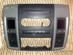 1KZ31TRMAB 2009-2012 Dodge Ram OEM Center Dash Bezel Tan Black Vents SEE INFO - Picture 1 of 22