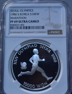 1986 10000 WON S.KOREA SEOUL OLYMPICS MARATHON NGC PF69 ULTRA CAMEO SILVER COIN - Picture 1 of 6