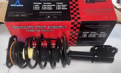 Conjunto de puntal de suspensión y resorte helicoidal delantero FCS 1332348 Foto 1 de 4