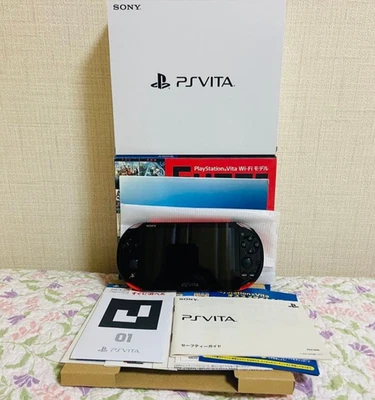 PS Vita Slim PCH-2000 rojo metálico (ZA26) paquete súper económico – probado Foto 1 de 4