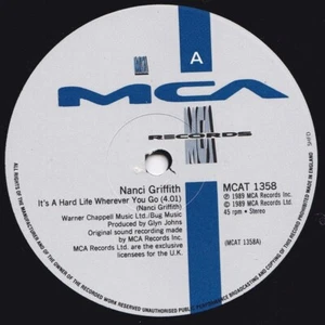 Nanci Griffith - It's A Hard Life Wherever You Go (12", Single) - Picture 1 of 2