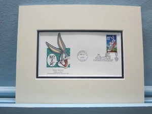 Saluting Bugs Bunny and the First Day Cover of his own stamp - Picture 1 of 1