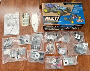 Brand new Open Bags Mugen MST-1 1/10 Stadium Truck Kit NO BODY RARE - Picture 1 of 3
