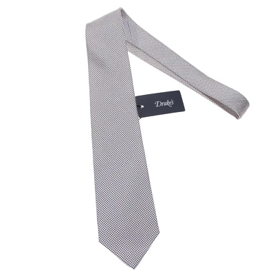 Corbata Drake's nueva con etiquetas en patrón geométrico azul y blanco 100 % seda Foto 1 de 4