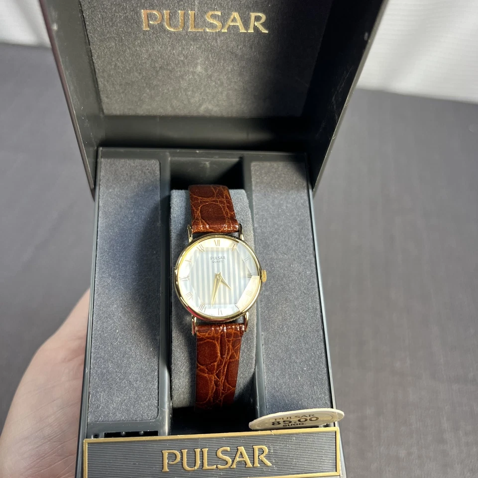 Vtg Pulsar V810-1090 Gold Tone Crystal Face Leather Band Gold Dial Women’s Watch