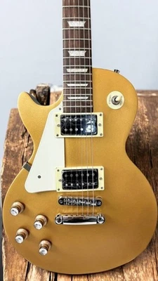 Guitarra eléctrica Harley Benton modelo de corte único para zurdos acabado dorado Foto 1 de 4