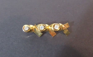 Broche pequeño de diamantes de imitación con lazo de cinta tono dorado 1 1/4" - Imagen 1 de 2