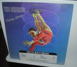 The Sherbs, DEFYING GRAVITY, LP record, promo, NM, clean, ATCO SD 38-146 - Picture 1 of 1