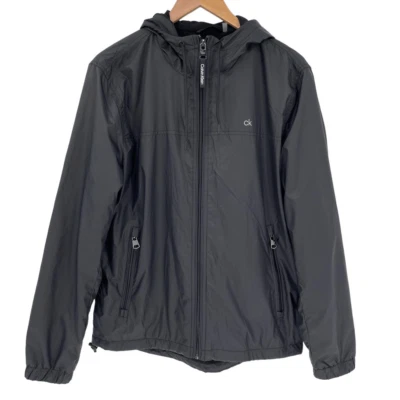 Chaqueta cortavientos con capucha forrada de lana Calvin Klein Softshell para hombre mediana negra Foto 1 de 4