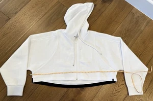 Zella weißer kurz geschnittener Hoodie mit Reißverschluss und schwarzem Besatz Large - Bild 1 von 8