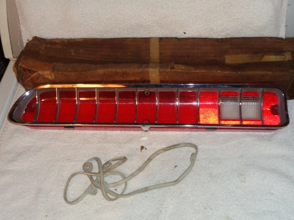 NOS Mopar 1970 Chrysler Newport Custom Left Tail Light - Image 1 of 1