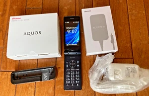 SHARP SH-02L AQUOS ANDROID KLAPPHANDY SCHWARZ ENTSPERRT mit Zubehör #T38 - Bild 1 von 9