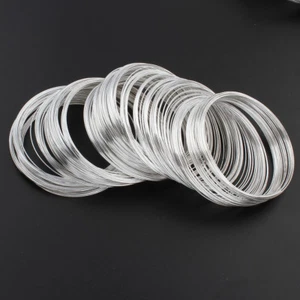 Armbänder Schmuckteile 50 Ringe Stahl MEMORY WIRE Spiraldraht 6cm Silber AZM290 - Imagen 1 de 2