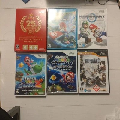 Nintendo Wii WiiU Game Lot Mario Kart Galaxy Biohazard Super Mario Collection - Image 1 of 4