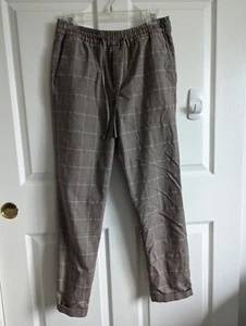Pantalones de chándal para mujer H&M marrón a cuadros con cordón y puños pequeños S - Imagen 1 de 24